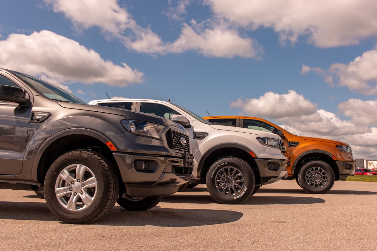 white and black suv on gray asphalt road under blue and white sunny cloudy sky during related to Ford Ranger Front Valance