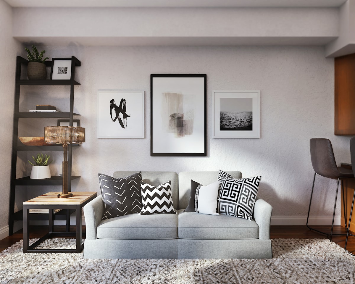 white and black throw pillow on white couch related to Revamped Living Rooms with Style