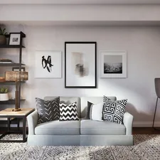 white and black throw pillow on white couch related to Revamped Living Rooms with Style