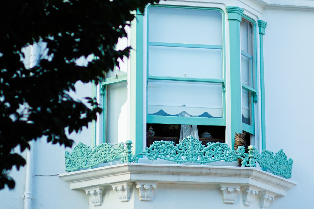 white and blue concrete building related to Window Valance Styles: A Comprehensive Guide