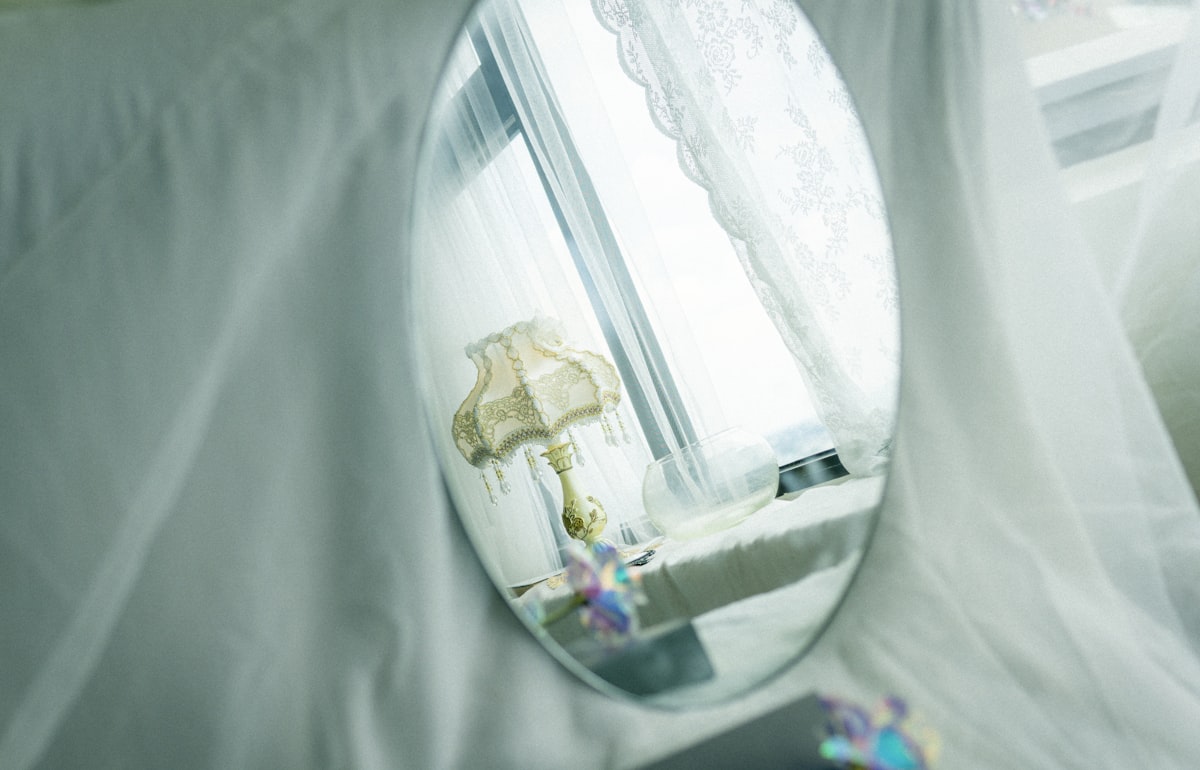 white and brown ceramic figurine related to Dreamy Abodes: Unveiling the Magic of Girls Canopy Beds