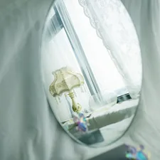 white and brown ceramic figurine related to Dreamy Abodes: Unveiling the Magic of Girls Canopy Beds