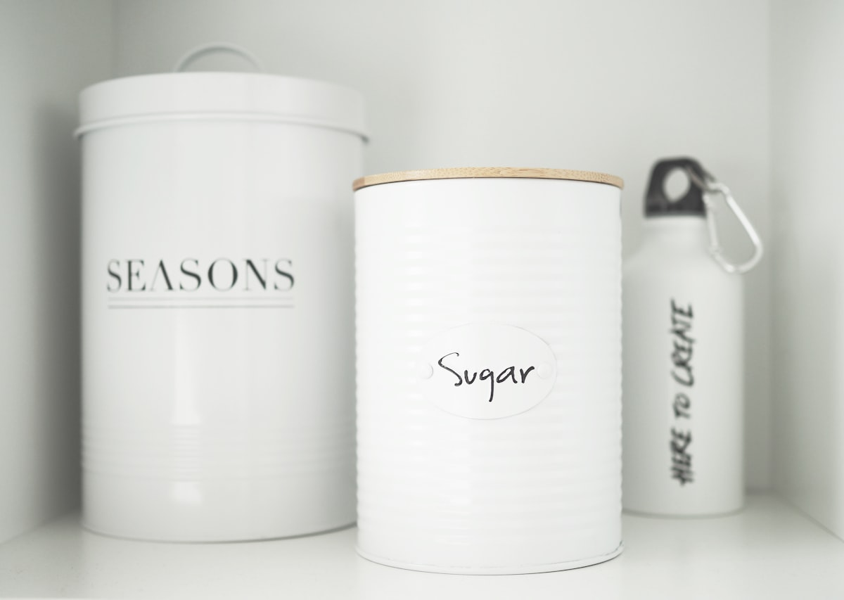 white and brown ceramic mug related to Elevate Your Kitchen Style with Bed Bath and Beyond Canister Sets