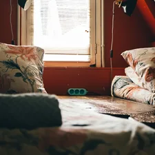 white and red floral throw pillow on white and red floral sofa related to Twin Bed Coverlets