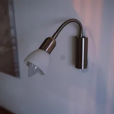 white and silver wall lamp related to Maximize Your Comfort: The Ultimate Guide to Clip-On Bed Lamps