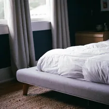 white bed by the window during daytime related to Platform Bed Coverlet