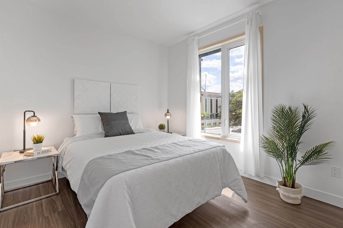 white bed linen near window related to The Ultimate Guide to Finding the Perfect 1-Bedroom Apartment