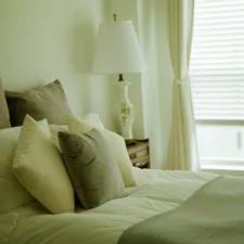 white bed pillow on bed related to Transforming Your Home with Bed Bath & Beyond Blinds