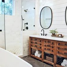 white ceramic bathtub near brown wooden cabinet related to Elevate Your Bathroom Style with a Shower Curtain and Valance