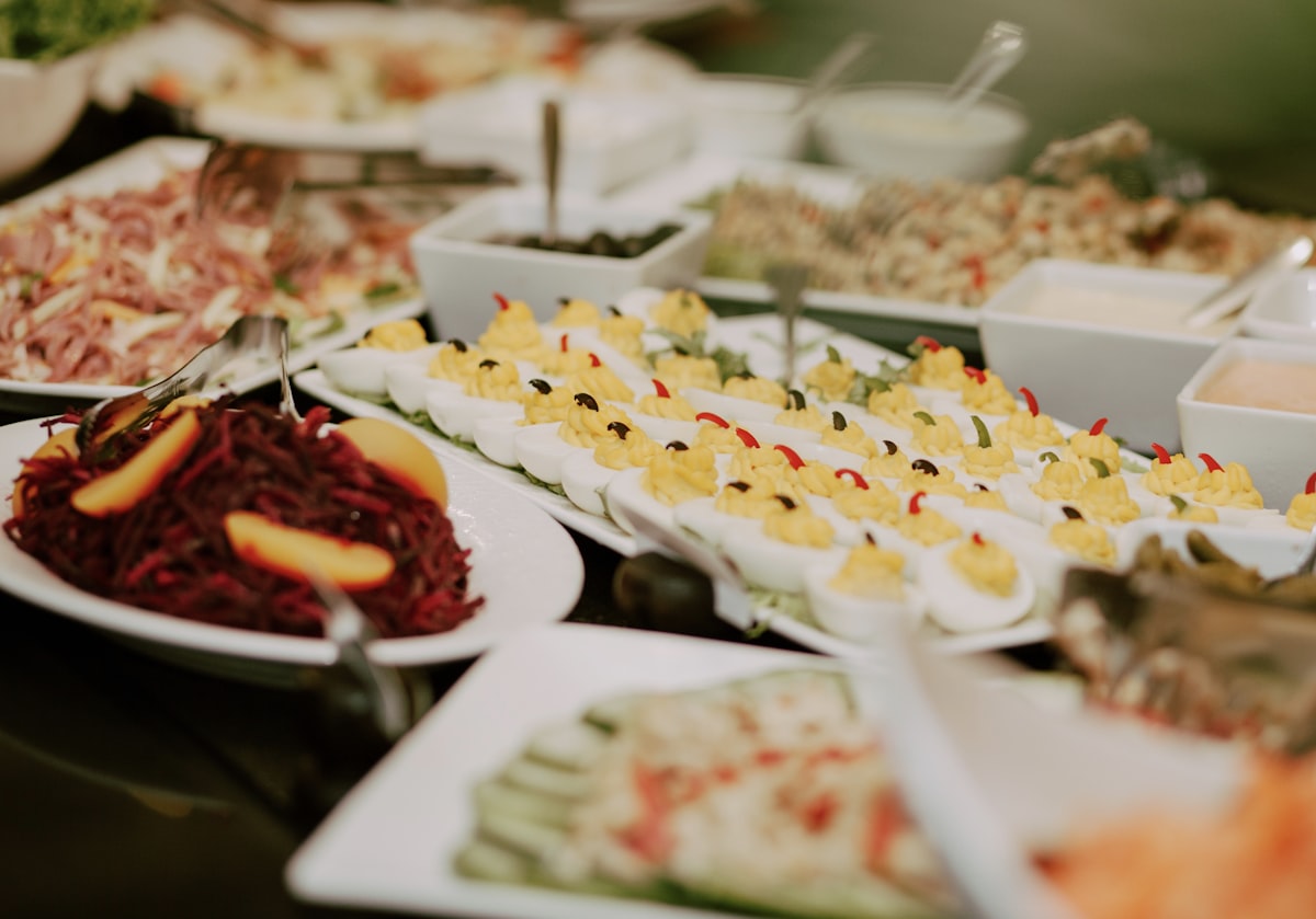 white ceramic plate with food related to Sophisticated Dining Solutions: Discover the Elegance of Large Buffets and Sideboards