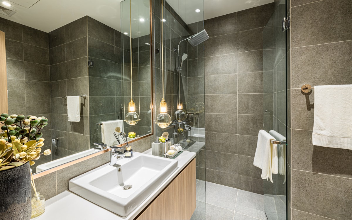 white ceramic sink with stainless steel faucet related to Valances for Bathrooms