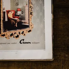 white framed photo of man in red and black coat related to Complete Guide to Crown Valances for Blinds