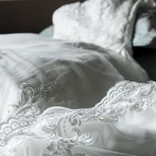 white lace wedding dress related to The Ultimate Guide to Skirted Bedspreads Coverlets