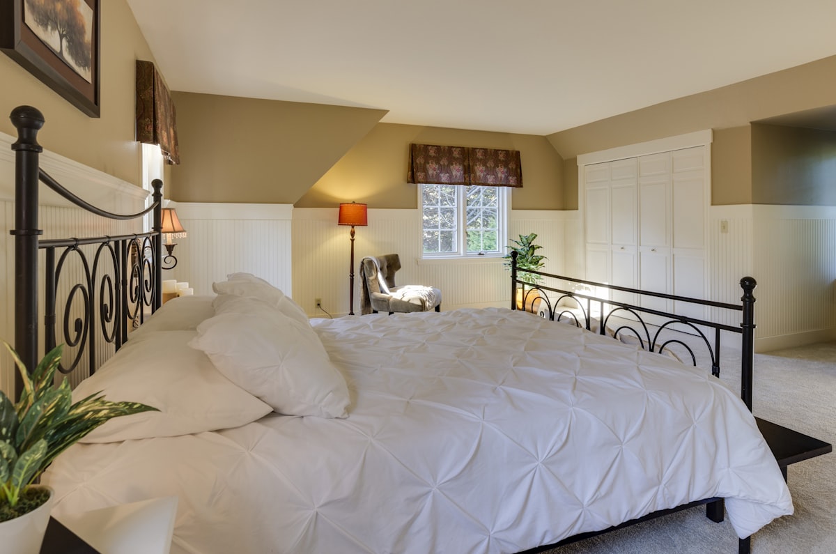 white mattress sheet and four white pillows related to Elegant Coverlet King Bedspreads for a Regal Bedroom
