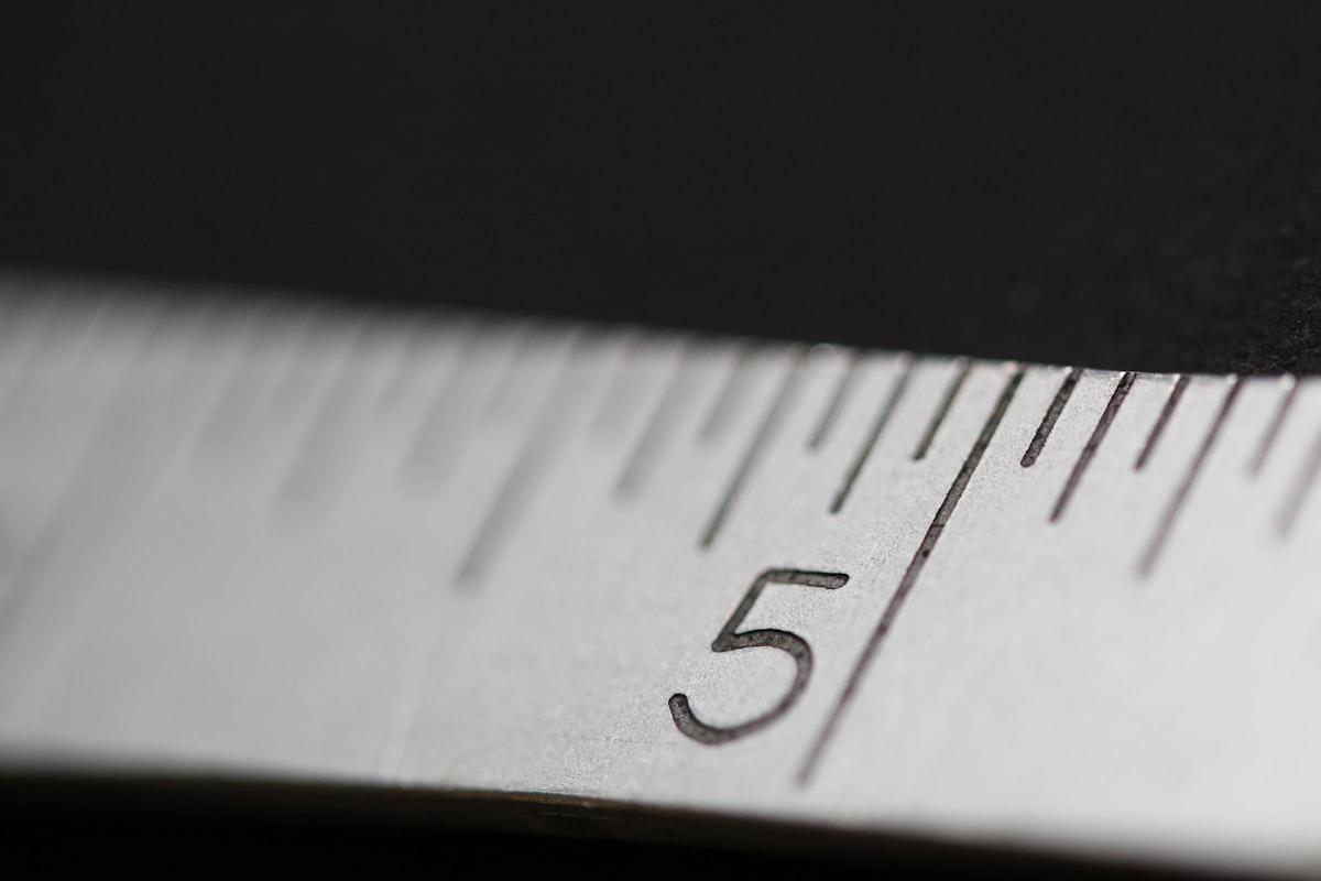 white measure tape related to Valance Length Rule: A Guide