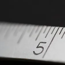 white measure tape related to Valance Length Rule: A Guide