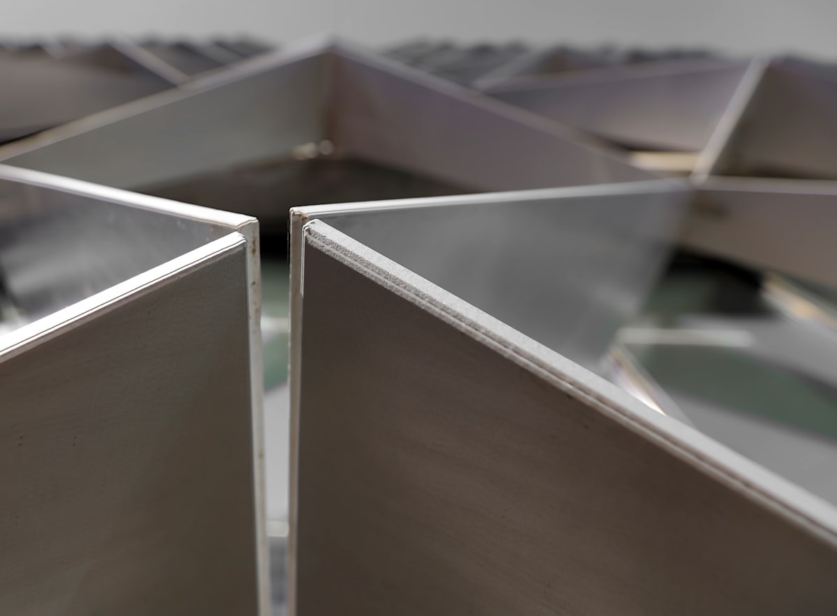 white metal board related to Crisp Nights by Design: The Ultimate Guide to Stainless Steel Chimenas