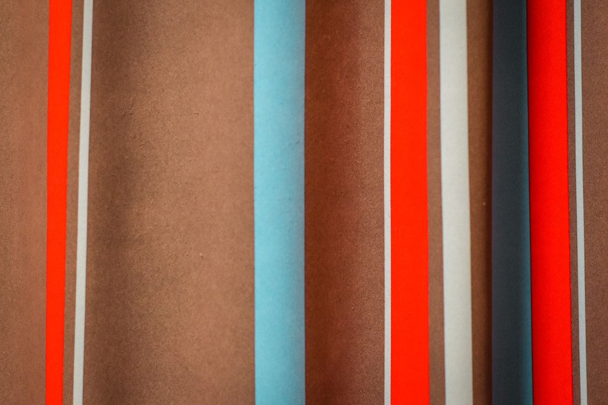 white orange and blue striped textile related to Striped Curtain Valances