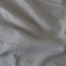 white textile on blue textile related to Light Grey Coverlets