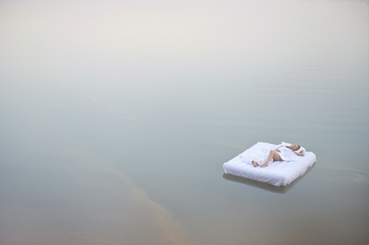 white tissue paper on white ceramic plate related to Whimsical Slumber: Creating a Dreamy Atmosphere with Canopy Beds for Girls