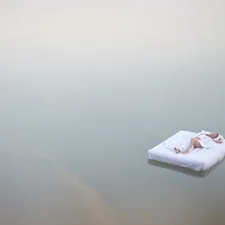 white tissue paper on white ceramic plate related to Whimsical Slumber: Creating a Dreamy Atmosphere with Canopy Beds for Girls