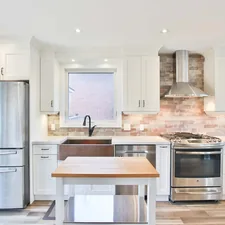 white top mount refrigerator beside white wooden kitchen cabinet related to Affordable Kitchen Valances