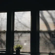 white window blinds on window related to Elevate Your Windows with Beautiful Curtains with Valance