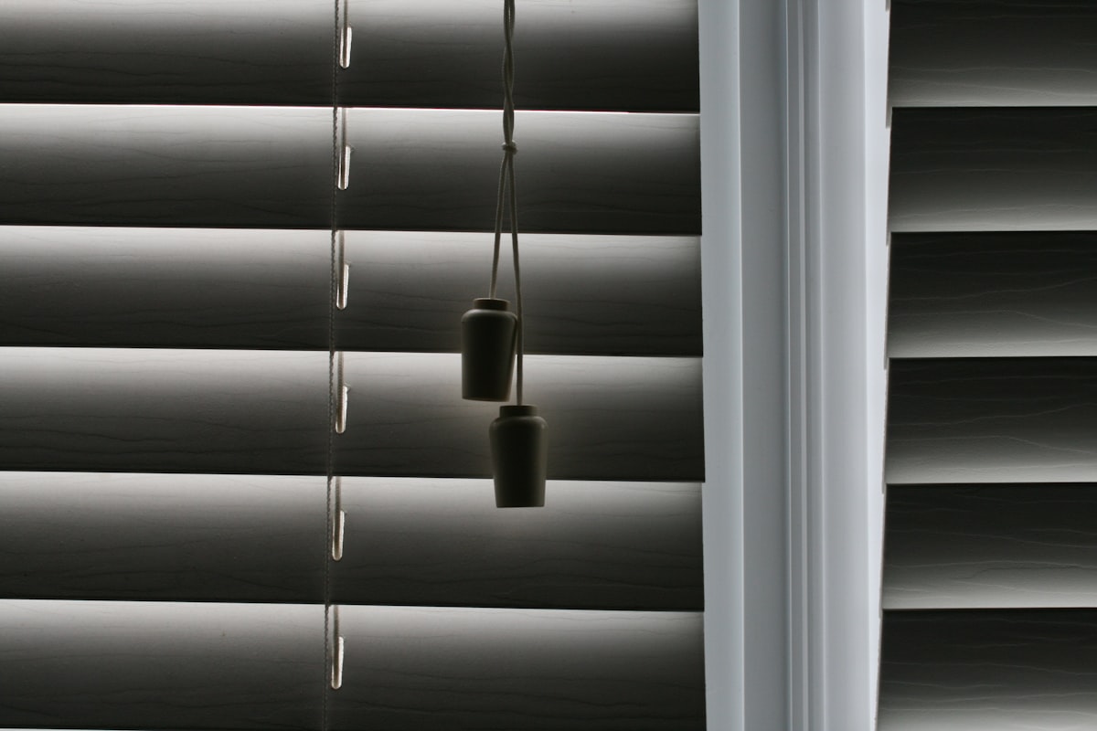 white window blinds with white light bulb related to Dark Grey Valance: A Timeless and Versatile Window Treatment