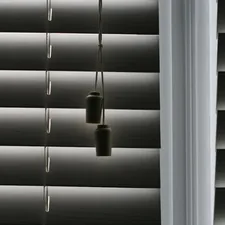 white window blinds with white light bulb related to Dark Grey Valance: A Timeless and Versatile Window Treatment