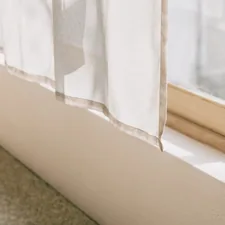white window curtain on window related to Elevate Your Windows: Valances and Cornices