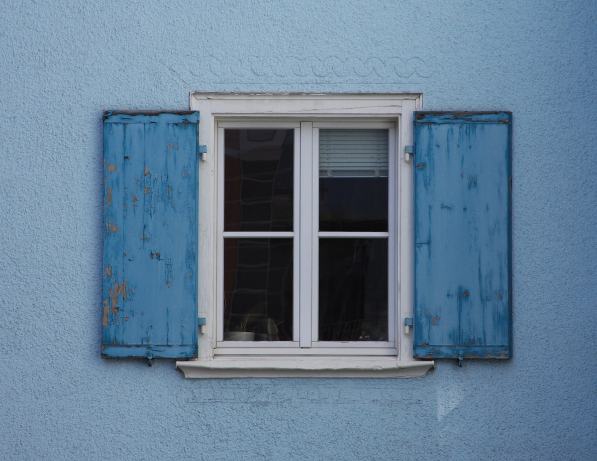 white wooden framed window close-up photography related to Blue Window Valances