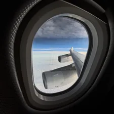 Wide angle shot of an airplane window related to Valances for Wide Windows: Perfecting Your View