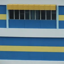 Window Painted yellow and blue related to A Comprehensive Guide to Window Blind Valance Clips