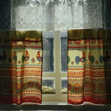Window with national embroidered curtains in an old Russian house. related to Enhancing Window Décor with Valances and Swags