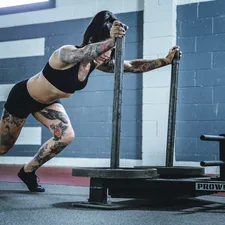 woman doing workout in room related to Unlock Endurance in the Bedroom: The Ultimate Guide