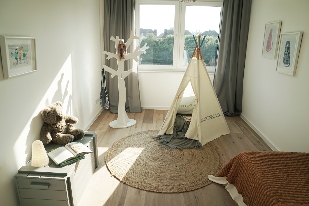 woman in white dress standing on white textile related to Cozy Nook for Little Ones: Choosing the Best Kids Bed Tent