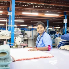 Woman is sewing in a textile factory. related to Thriving Careers at Bed Bath & Beyond: Your Path to Success