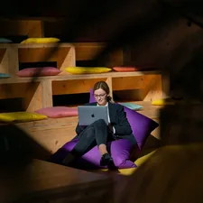 Woman remote work bean bag coworking office related to Ultimate Comfort with Versatile Seating Solutions