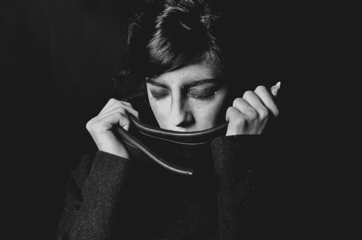 woman standing wearing black sweater related to Elegant and Timeless: The Black and White Toile Valance