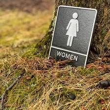 women signage related to How to Stop Peeing in the Bed: A Comprehensive Guide