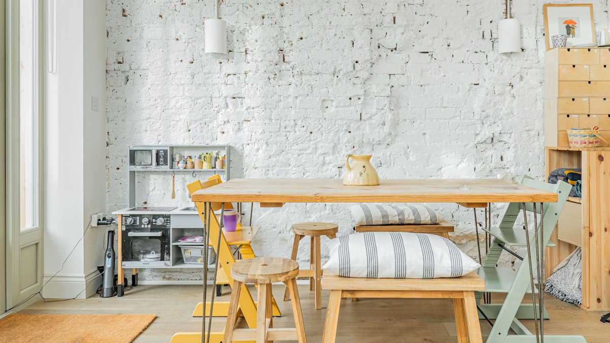 Wooden Dining Table in Minimalist Kitchen Setting related to Enhancing your Home with the Perfect Indoor Entryway Rugs