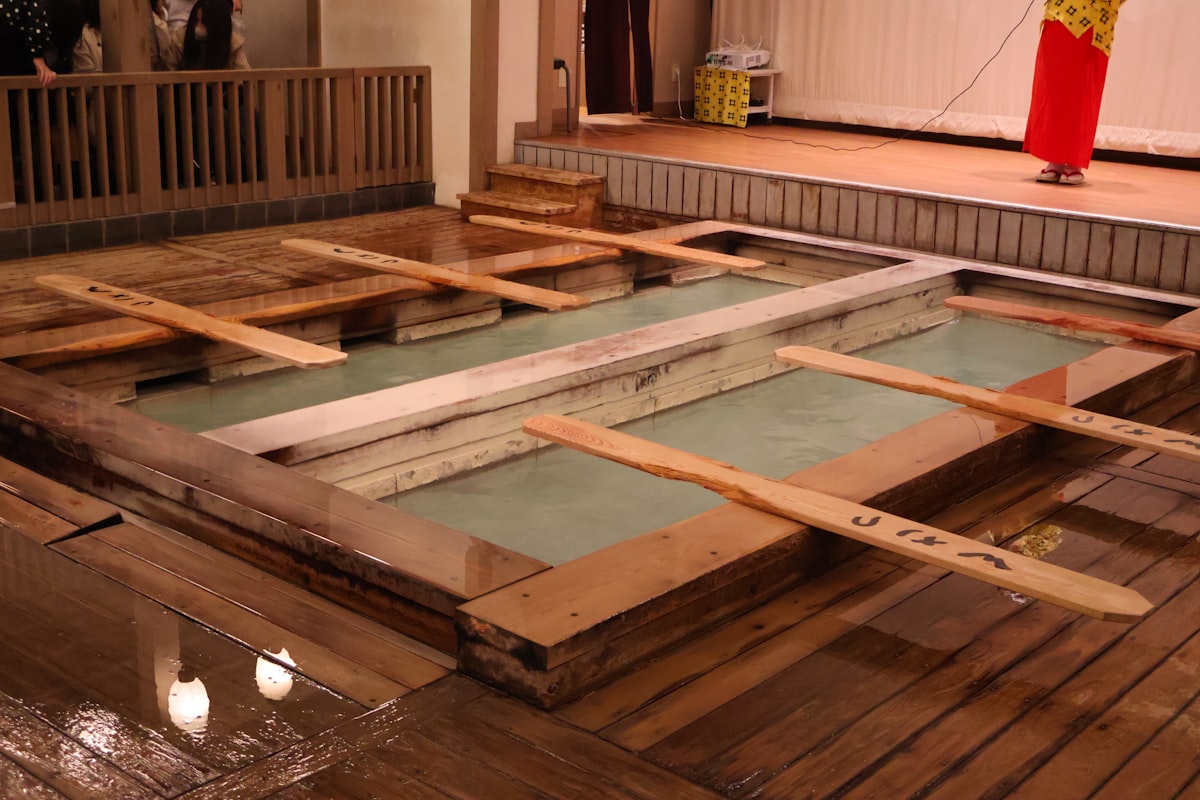 Wooden hot spring bath with wooden slats related to Elevate Your Sleep: A Comprehensive Guide to Japanese Bed Frames