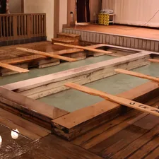 Wooden hot spring bath with wooden slats related to Elevate Your Sleep: A Comprehensive Guide to Japanese Bed Frames