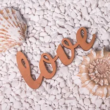 Word "Love" at white stones related to Cozy Up with the Best: A Guide to Lowes Chiminea Cast Iron