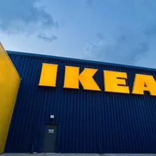 yellow and black building under white clouds during daytime related to Maximizing Your Home Storage with Sideboards and Buffets from IKEA