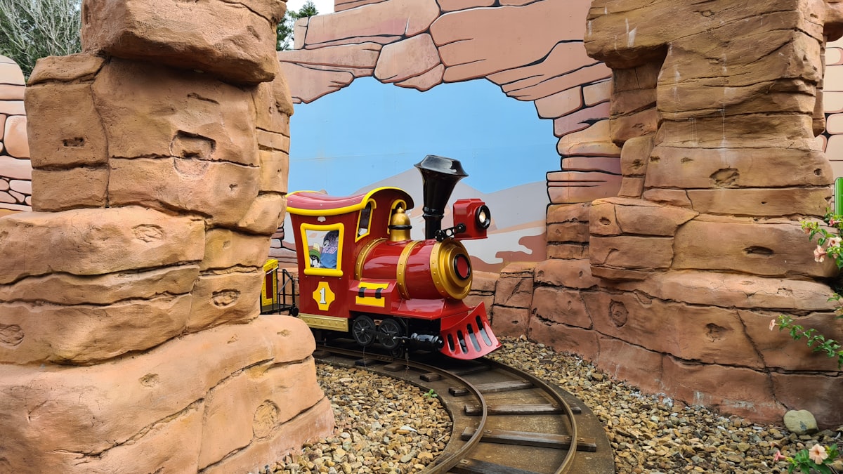 yellow and black train on rail tracks related to Thomas the Train Valance: A Touch of Nostalgia for Your Nursery