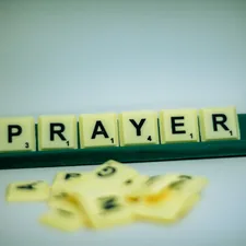 yellow and green letter t related to Divine Slumber: The Power of Prayers Before Bed
