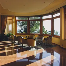 Yellow hotel interior related to Elevating Your Bay Window with a Stunning Valance
