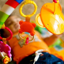 yellow red blue and green beaded accessory related to Exploring Toys 'R' Us Baby Bedding Sets: Comfort and Style for Your Little One